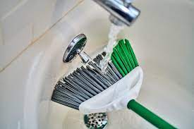Use your hand to pull out the big stuff. How To Clean A Dusty Dirty Broom Kitchn