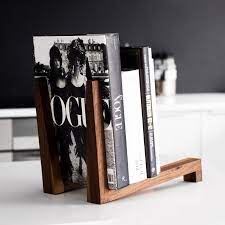 When decorating your coffee table, remember that placement matters, too. Books Can Be Displayed Just As Well As Records Can Give Your Favourite Books The Attention They Book Stands Coffee Table Books Decor Decorating Coffee Tables