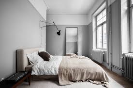 This primary bedroom boasts stunning gray walls along with a large bed. Neutral Bedroom Decorating Ideas Expert Tips Tlc Interiors