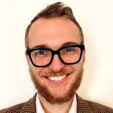 Does gas-phase sulfur dioxide remove films of atmosphere-extracted organic  material from the aqueous aerosol air–water interface?