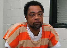 Jailed suspect admits drug fraud but denies arson charge