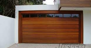 It is far better to take your vehicle to a mechanic that specializes in exhaust systems in addition to some other repairs. Modern Garage Modern Garage Door Modern 2 Car Garage Doors Garage Doors Garage Door Styles Garage Door Design