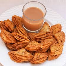 Tikona Nimki Recipe How To Make Delicious Crunchy And Spicy Nimki Snack Spicy Snacks Recipes Indian Snack Recipes Veg Snacks