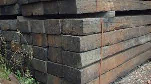 How to build a garden wall with railway sleepers. Building A Retaining Wall With Railway Sleepers