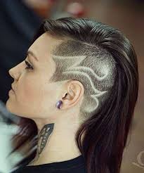 Using a standard undercut, flavored with very light hair color, and slight curls on top. Womens Shaved Undercut Hairstyles Novocom Top