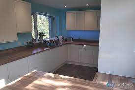 handleless alabaster gloss real kitchens