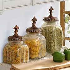 Whole housewares clear glass canisters set the ribbed glass on these glass canister sets adds a little something extra when it comes to. Clear Fleur De Lis Canister Set Of 3 Kirklands