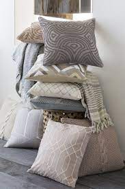Mixing and matching is a breeze and almost any combination of these will work. Stack Of Unique Neutral And Muted Color Surya Pillows In A Variety Of Pattern Style Color And Texture Pillows Comfy Pillows Colorful Pillows