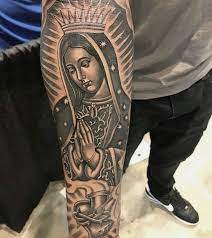The tattoo designs are inspired by the historic blessed virgin mary paintings, sculptures, and other forms of art. Virgin Mary Tattoo Mary Tattoo Virgin Mary Tattoo Wrist Tattoos For Guys
