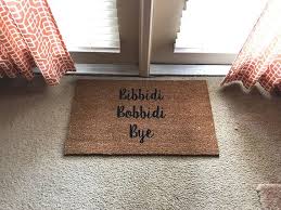 Make A Fashionable Entrance And Exit With These Disney Inspired Door Mats Door Mat Funny Door Signs Disney Decor