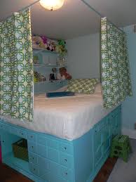 Claire S Bedroom Repurposed Dressers Used To Lift Bed Slats Along Wall Hold The Plywood That Covers Dresser Diy Loft Bed Repurposed Dresser Remodel Bedroom