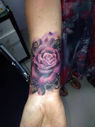 The black rose tattoo portrays a beautiful texture, decorated around your wrist. Pin By A C On Ink I Like Rose Tattoos On Wrist Purple Rose Tattoos Violet Tattoo