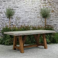 Outdoor Tables On Sale Now An Outdoor Table From Our Teak Outdoor Furniture Collecti Concrete Dining Table Outdoor Furniture Collections Diy Outdoor Furniture