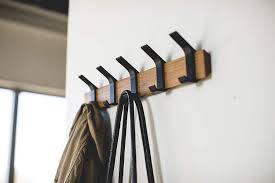 Hang up regularly used clothing items or clothes that need to dry. Amazon Com Yamazaki Home Rin Wall Mounted Coat Hanger Brown Furniture Decor