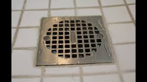 The shower pan is designed to sit just below the surface of the shower and protect the subfloor of the bathroom beneath from water damage. How To Fix A Slow Draining Shower Youtube