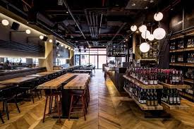 The Color Scheme Was Thought Of As A Dialogue Between Warm And Cool Colors From The Dark Brown Almo Bar Design Restaurant Restaurant Design Bar Design Awards