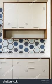 white kitchen cabinets wood trim