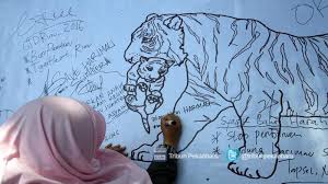 Baru 34+ gambar romantis indonesia. Foto Kampanye Penyelamatan Harimau Sumatera Di Taman Kota Pekanbaru Tribun Pekanbaru