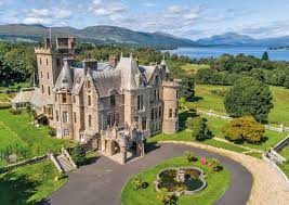 Loch lomond is a freshwater loch (scottish lake) on the boundary between the highlands and lowlands of scotland. A Fantasy Castle For Sale On Loch Lomond With A Rennie Mackintosh Library And A Herd Of Highland Cattle Country Life
