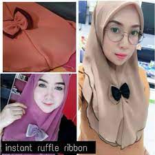 Perkongsian video dimuat naik @saya_fazly memaparkan pemuda. Tudung Bawal Riben