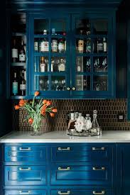 Blue Lacquer Pantry Cabinets Balanced By White Marble Countertops Are Accented With Gold White Marble Countertops Blue Kitchen Cabinets Kitchen And Bath Design