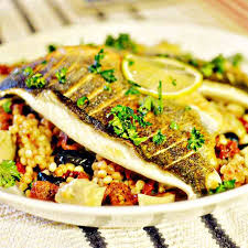 Add olive oil, when the oil is hot, put the seabass fillet in the pan, skin side down. Dishfolio Eat Share Drool