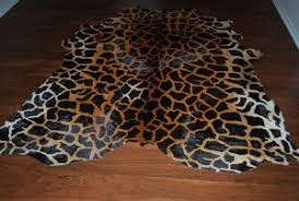 This spotted cat closely resembles the leopard, but is usually larger and sturdier. Stencil Cowhide Animal Print Cowhide Rugs
