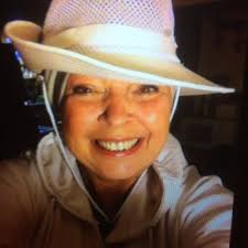 Film director Steven Spielberg and film editor Verna Fields looking over  footage