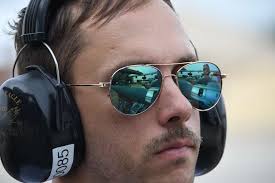 Naval mines are reflected in the sunglasses of Joshua