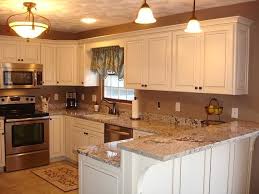 It allows the cook to chat with guests while finishing up meal prep, it keeps guests out of the kitchen while the cook finishes meal prep, it provides convenient seating for serving. Kitchen Island With Granite Top And Breakfast Bar Ideas On Foter Kitchen Remodel Small Kitchen Island With Granite Top Kitchen Renovation