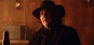 Movie Review: Cusack dons the Black Hat in gritty Western “Never Grow Old”  – Movie Nation