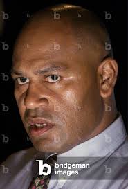 Image of Coup leader George Speight speaks at a news conference at