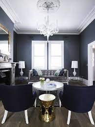 Sophisticated Living Room With Charcoal Grey Wells And Plenty Of White Molding Blue And White Living Room Gold Living Room Living Room Grey