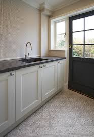 Stylish Utility Room Space With Black Worktops And Laura Ashley Mr Jones Dove G In 2020 Grey Kitchen Floor Interior Design Kitchen Interior Design Kitchen Contemporary