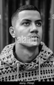 Corrugated iron, rusty, with black metal windows, abstract design,  neighbourhood street, Tano, Kochi, Shikoku, Japan Stock Photo