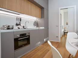 In the interior components of a minimalist small kitchen set , the minimum size for the width of the upper cabinet from the wall is 30 cm. 16 Tips For A Small Minimalist Kitchen