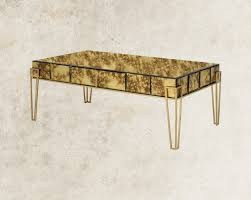 Antiqued mirrored veneers on top and all sides. Adoncia Coffee Table Antique Mirror Coffee Table Furniturewalla