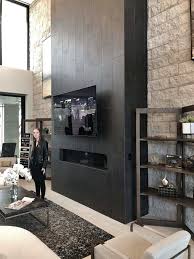 the new american remodel home tour 2020 a sophisticated modern home designed tiled fireplace wall black fireplace wall fireplace modern design