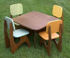 Features two chairs and a center panel in the table for smart storage. 30 X 30 Modern Child Table Set With 4 Chairs Wooden Childrens Table Modern Kids Table Kid Table