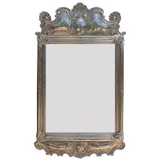 Check spelling or type a new query. Portuguese Embossed Alpaca Silver Mirror Frame With A Seashell And Peacock Design For Sale At 1stdibs