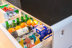 Besides juicing you up with refreshments it does that to your phone and other devices as well with 2 usb charging oh, and did we mention it has built in led lights, bluetooth speakers and a touch control panel? Refrigerator Coffee Table