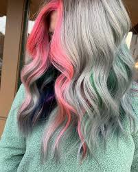 Rainbow colored hair has been tickling our colors fancy as of late. Trend Watch Rainbow Money Piece Get The Vivid Color Of Your Wildest Dreams Anushka Spa Salon