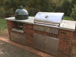 Outdoor kitchen with big green egg and double side burner! Home Living Blog Green Egg Built In Outdoor Kitchen