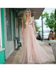 This rose gold tulle maxi dress with sequin top is perfect for any special occasion! Rose Gold Tulle Dress Cousin Couture
