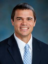 God Gave Him the Right Answers:' Aurora Council Candidate Watches a Pastor  Raise Money for Him at Church -- in Apparent Violation of IRS Rules