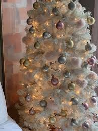 Layer lots of ornaments, lights and tinsel for a lush traditional feel. Chic Teen Christmas Tree Haneen S Haven