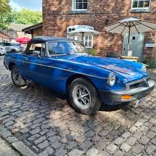 Image result for Tahiti Blue 1977 MG