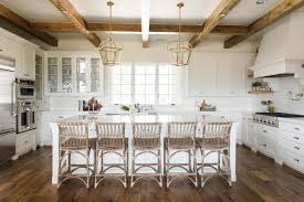 When you are decorating a kitchen in the farmhouse style, don't overlook the sink because it can be a charming and practical addition to your home decor. Sophisticated Farmhouse Style Kitchen With Wood Beams Hgtv S 2019 Designer Of The Year Awards Hgtv