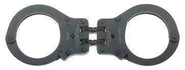Kate is led in handcuffs onto the plane. Hinged Handcuffs Peerless Handcuff Company