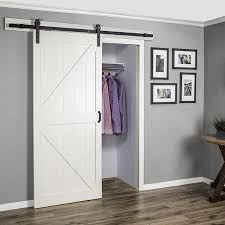 Start The New Year On Trend A With A Sliding Barn Door For Your Closet Shop With The Link In Pro White Barn Door Barn Door Designs Interior Sliding Barn Doors